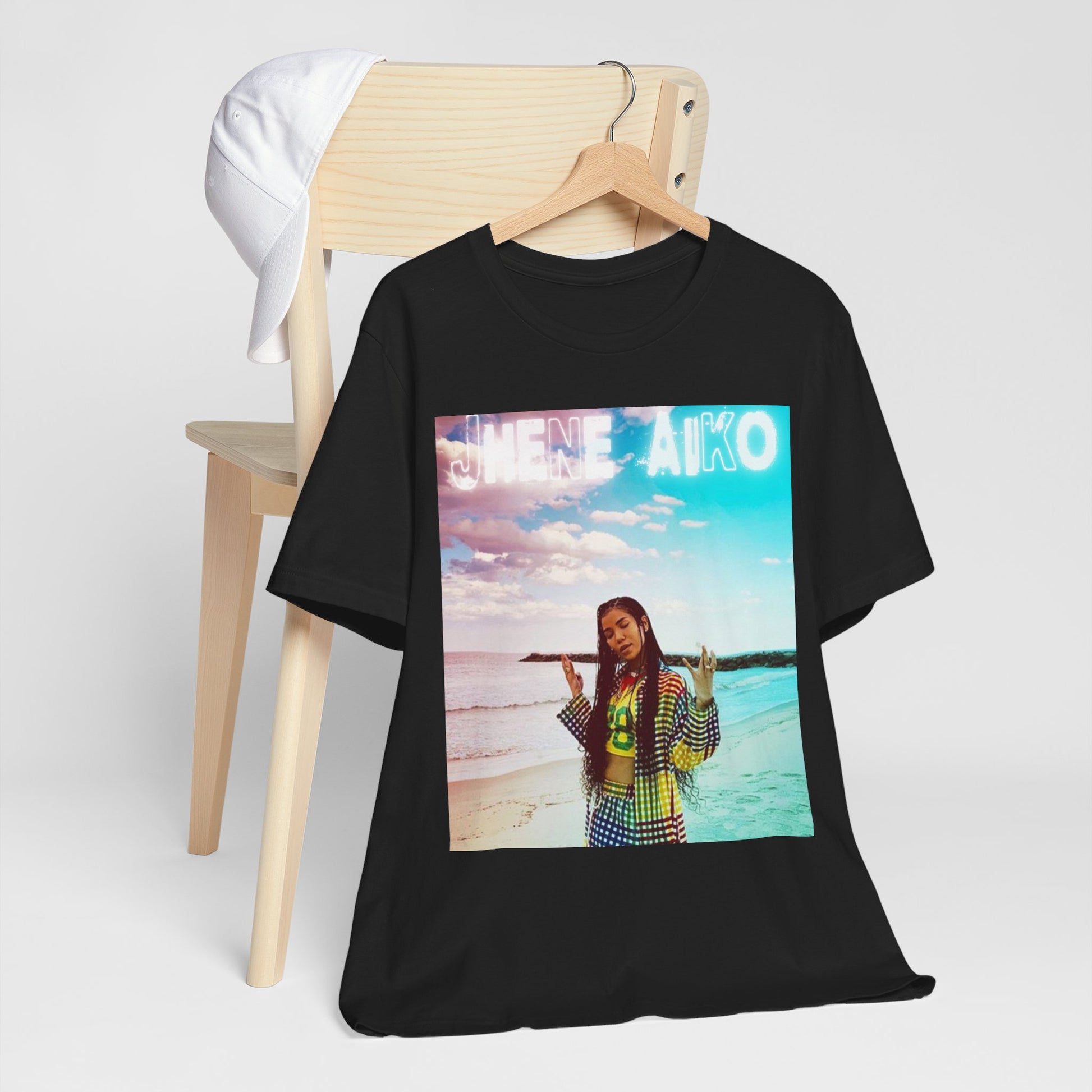 A black graphic t-shirt featuring a vintage ethereal R&B graphic of Jhene Aiko.