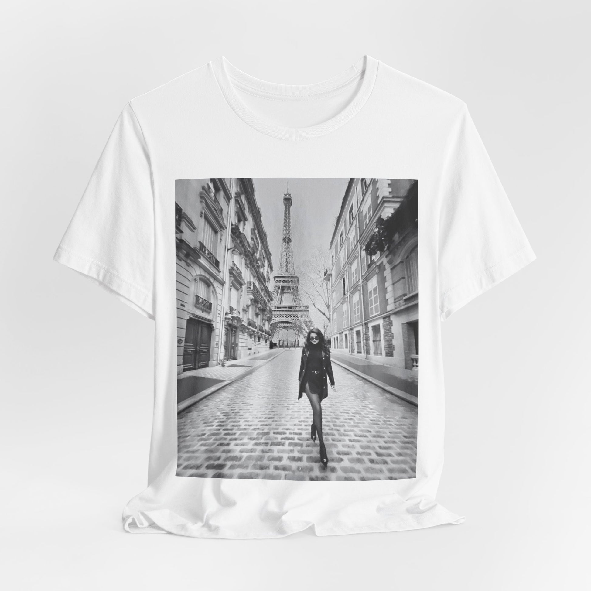 A black graphic t-shirt featuring a black and white photo of Selena Gomez in Paris.