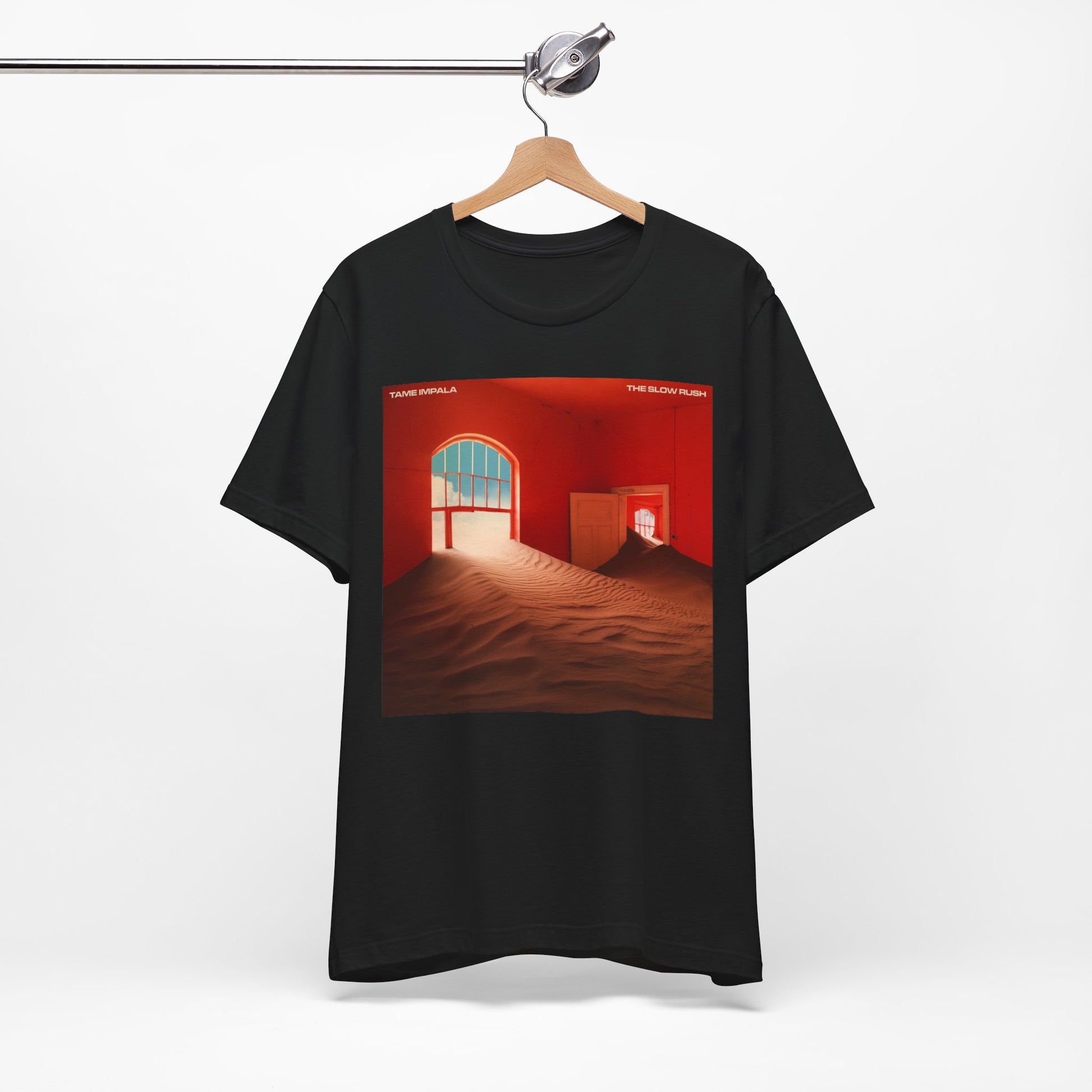 A black graphic t-shirt featuring a graphic related to Tame Impala's 'The Slow Rush' album.