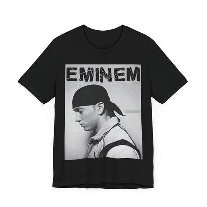 A black graphic t-shirt featuring a stylized graphic of Eminem as a modern rap legend.