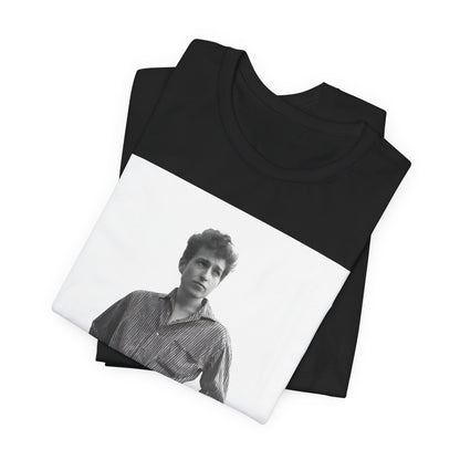 A black graphic t-shirt featuring a vintage 60s folk aesthetic graphic of Bob Dylan.