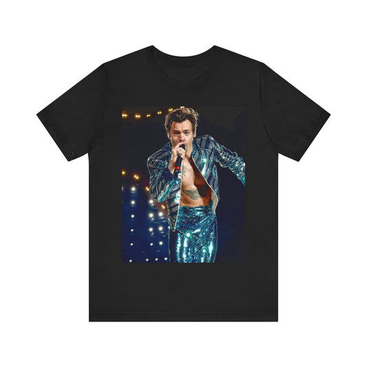 A black graphic t-shirt featuring a graphic related to Harry Styles' 'Adore You' song or era.