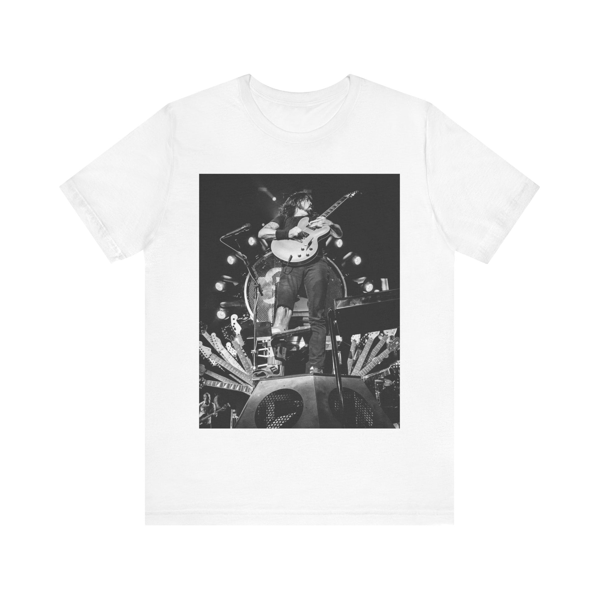 A black graphic t-shirt featuring a vintage photo of Foo Fighters performing live.