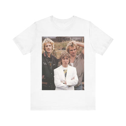 A black graphic t-shirt featuring a graphic of The Police as a timeless three-piece band.
