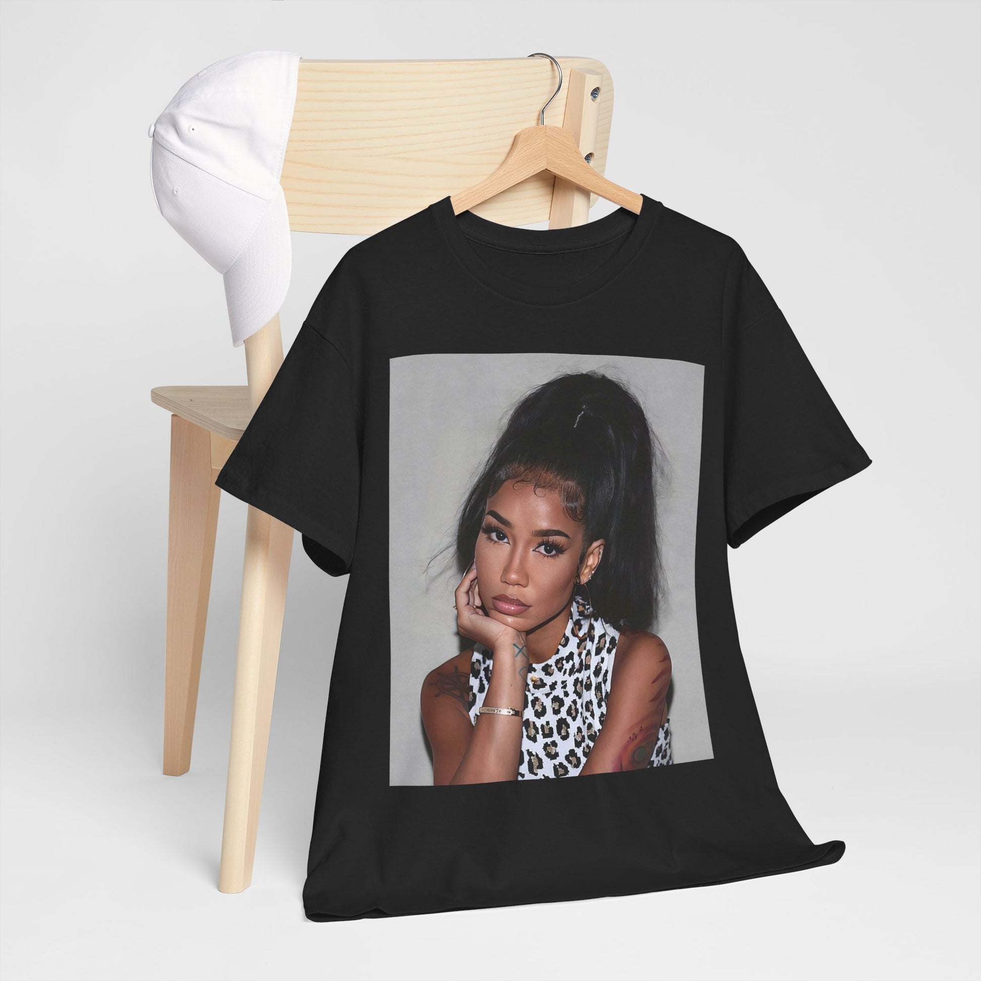 A black graphic t-shirt featuring a graphic related to Jhene Aiko's 'Trip' album era, with an aesthetic design.