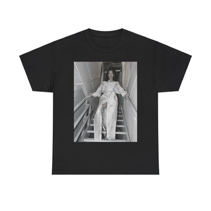 A black graphic t-shirt featuring a graphic or photo of Jhene Aiko in a backstage setting.