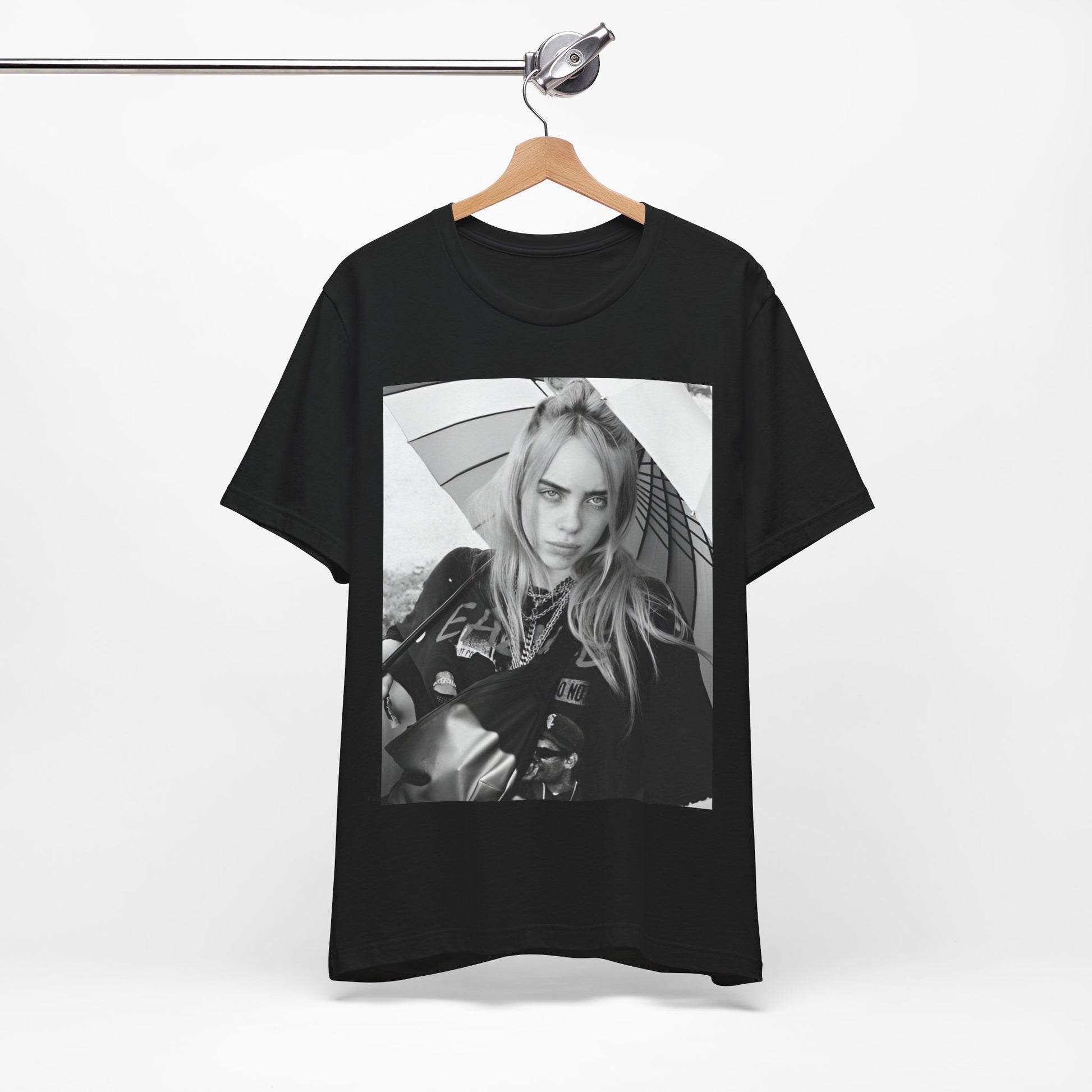 A graphic t-shirt inspired by the colorful and iconic music video for "Bad Guy" by Billie Eilish.