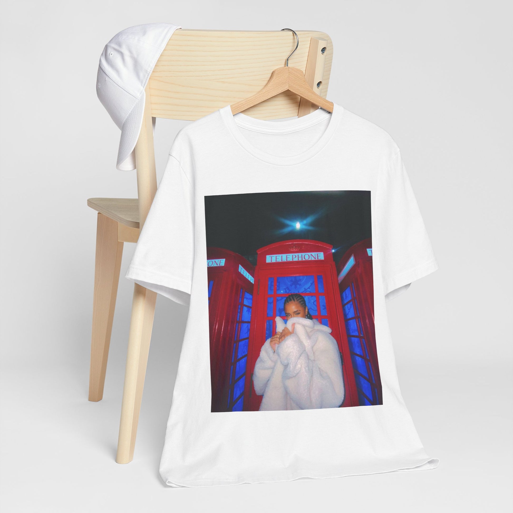 A black graphic t-shirt featuring a rhythmic dance pop graphic of Tyla.
