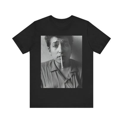 A black graphic t-shirt featuring a graphic of Bob Dylan from the 60s, depicted as a renegade folk icon.