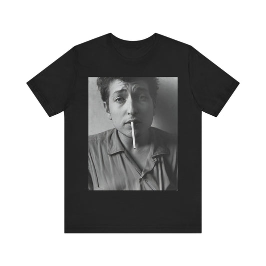 A black graphic t-shirt featuring a graphic of Bob Dylan from the 60s, depicted as a renegade folk icon.