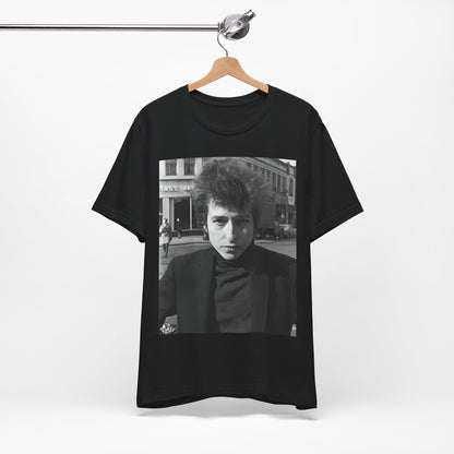 A black graphic t-shirt featuring a 60s black and white photo portrait of Bob Dylan.