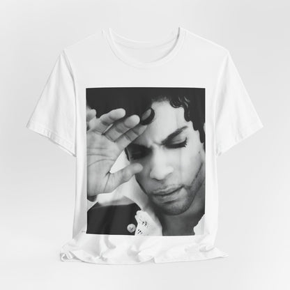 A black graphic t-shirt featuring a black and white graphic or photo portrait of Prince.