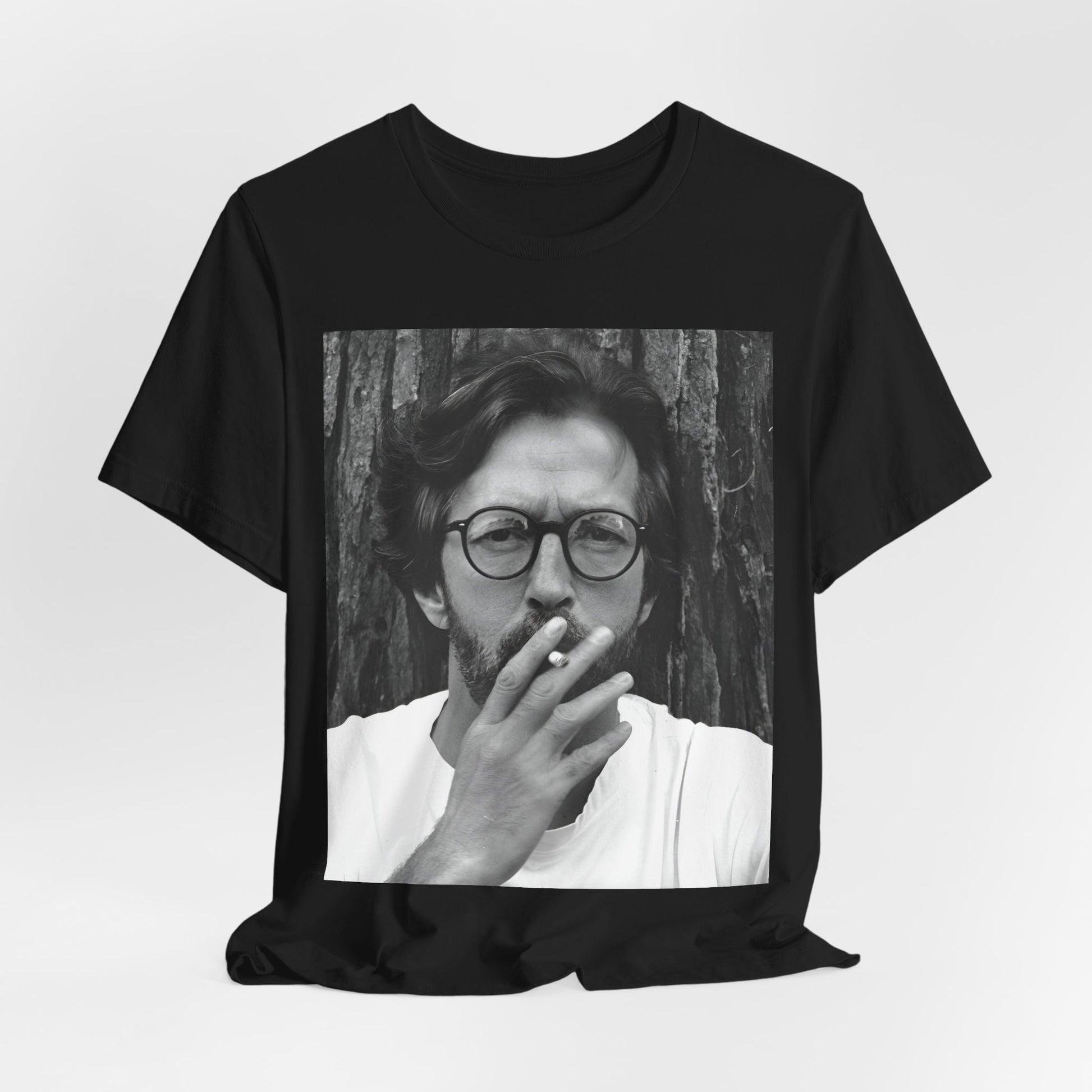 A black graphic t-shirt featuring a graphic related to Eric Clapton's classic Cream era.
