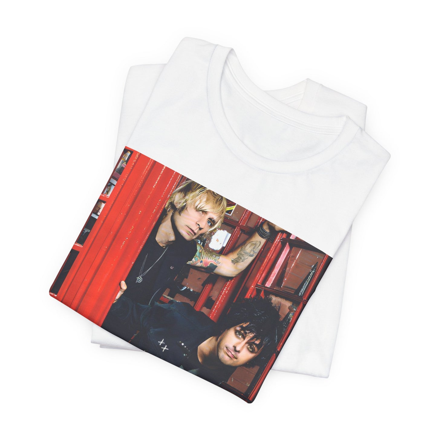 A black graphic t-shirt featuring a photo of Green Day members near a classic red London telephone box.