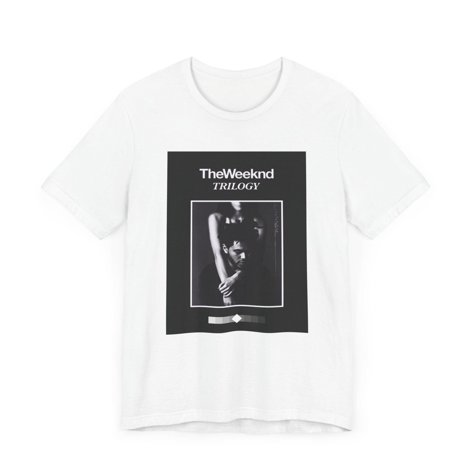 A black graphic t-shirt featuring a graphic related to The Weeknd's 'Trilogy' album.