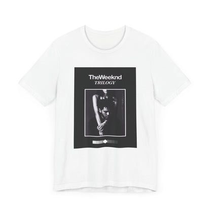 A black graphic t-shirt featuring a graphic related to The Weeknd's 'Trilogy' album.
