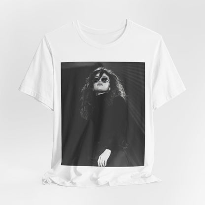 A black graphic t-shirt featuring a black and white, monochrome graphic or photo of Selena Gomez.