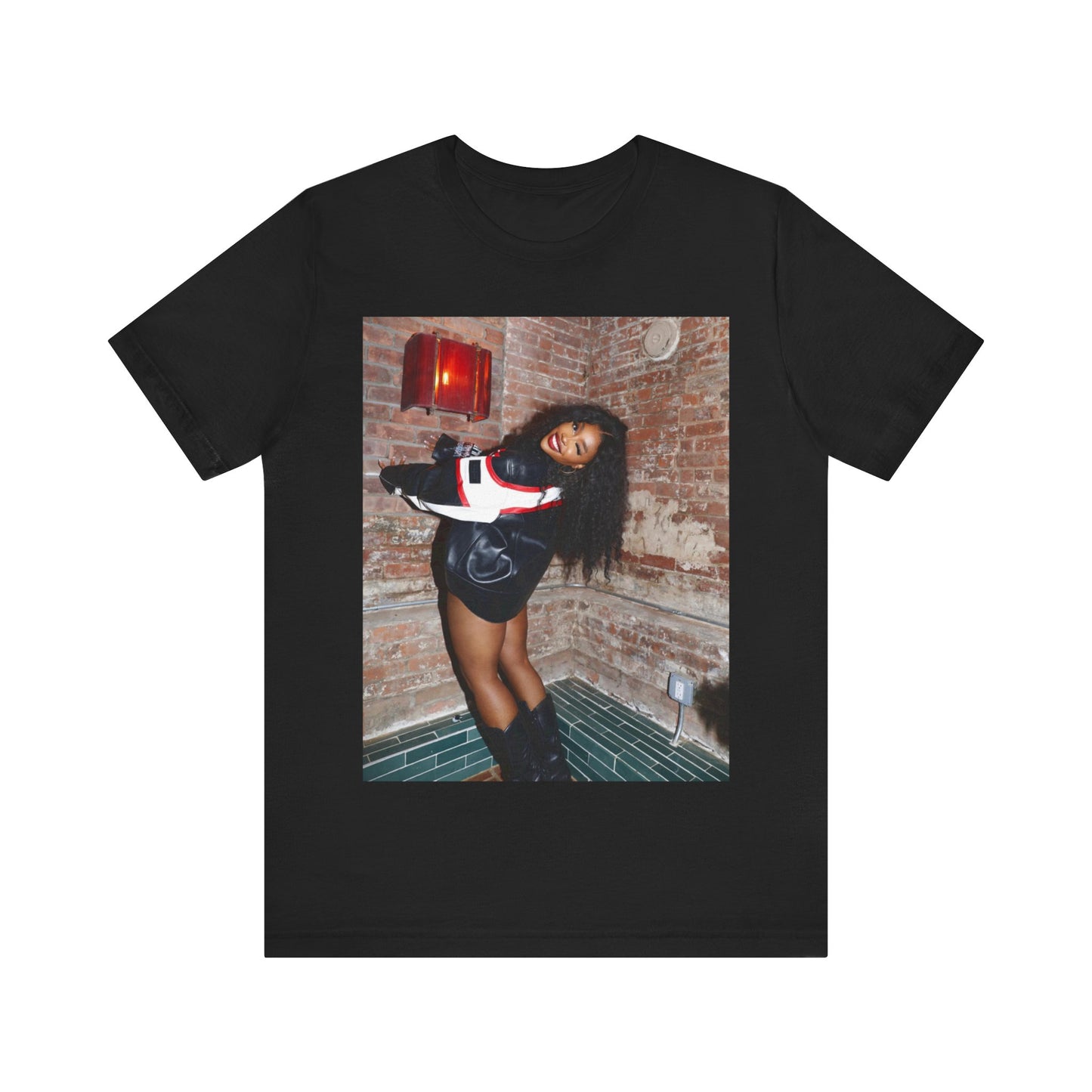 A black graphic t-shirt featuring a graphic of SZA as a TDE Queen R&B icon.