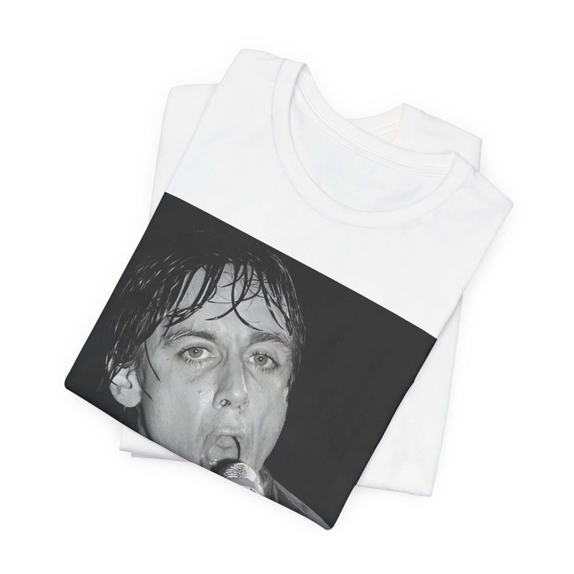 A black graphic t-shirt featuring a 70s graphic or photo of Iggy Pop performing in a wild concert.