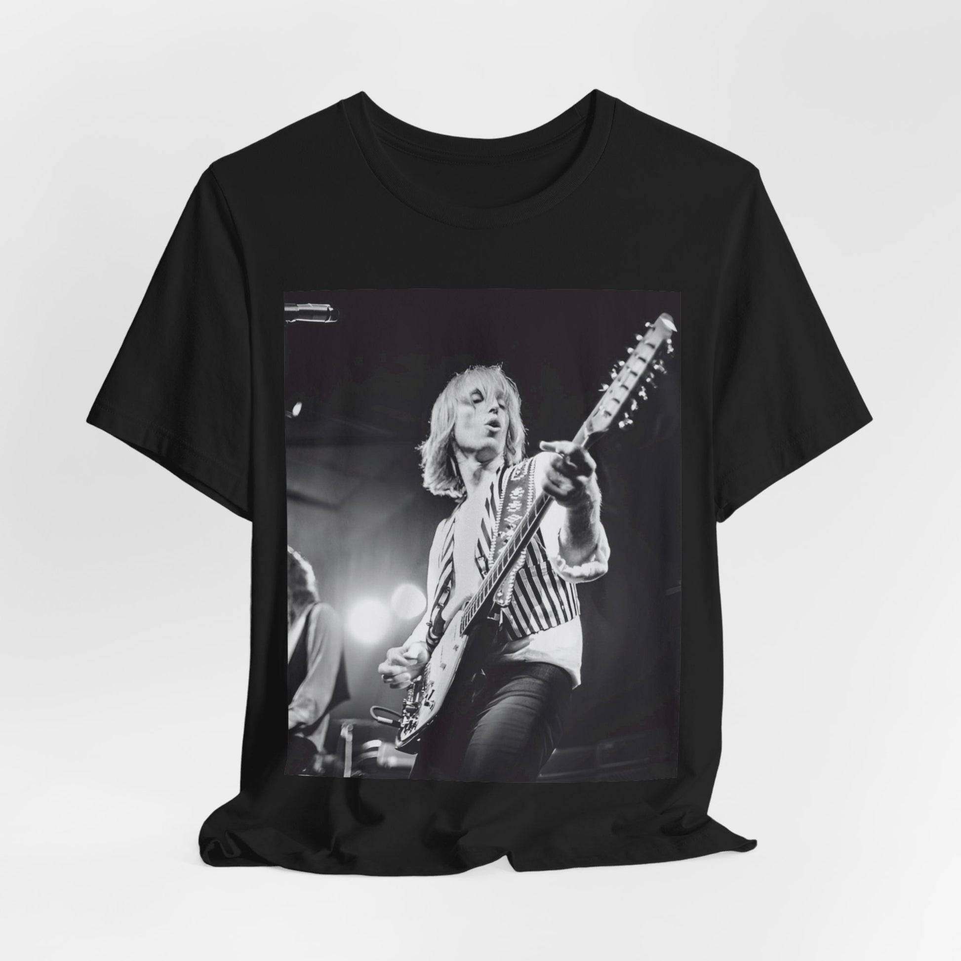 A black graphic t-shirt featuring a graphic of Tom Petty as a Rock & Roll Hall of Fame icon.