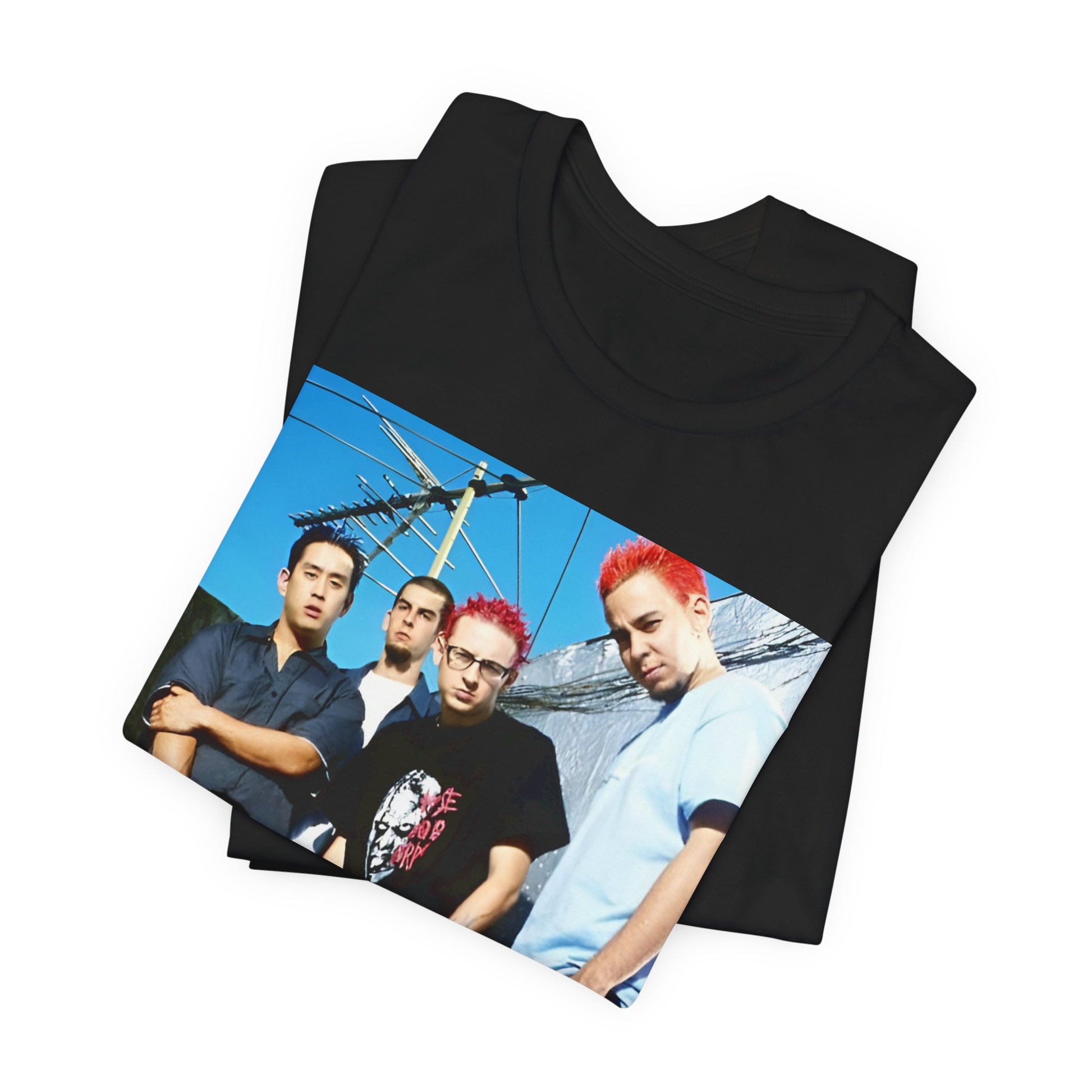 A black graphic t-shirt featuring a graphic of Linkin Park as a global nu rock phenomenon.