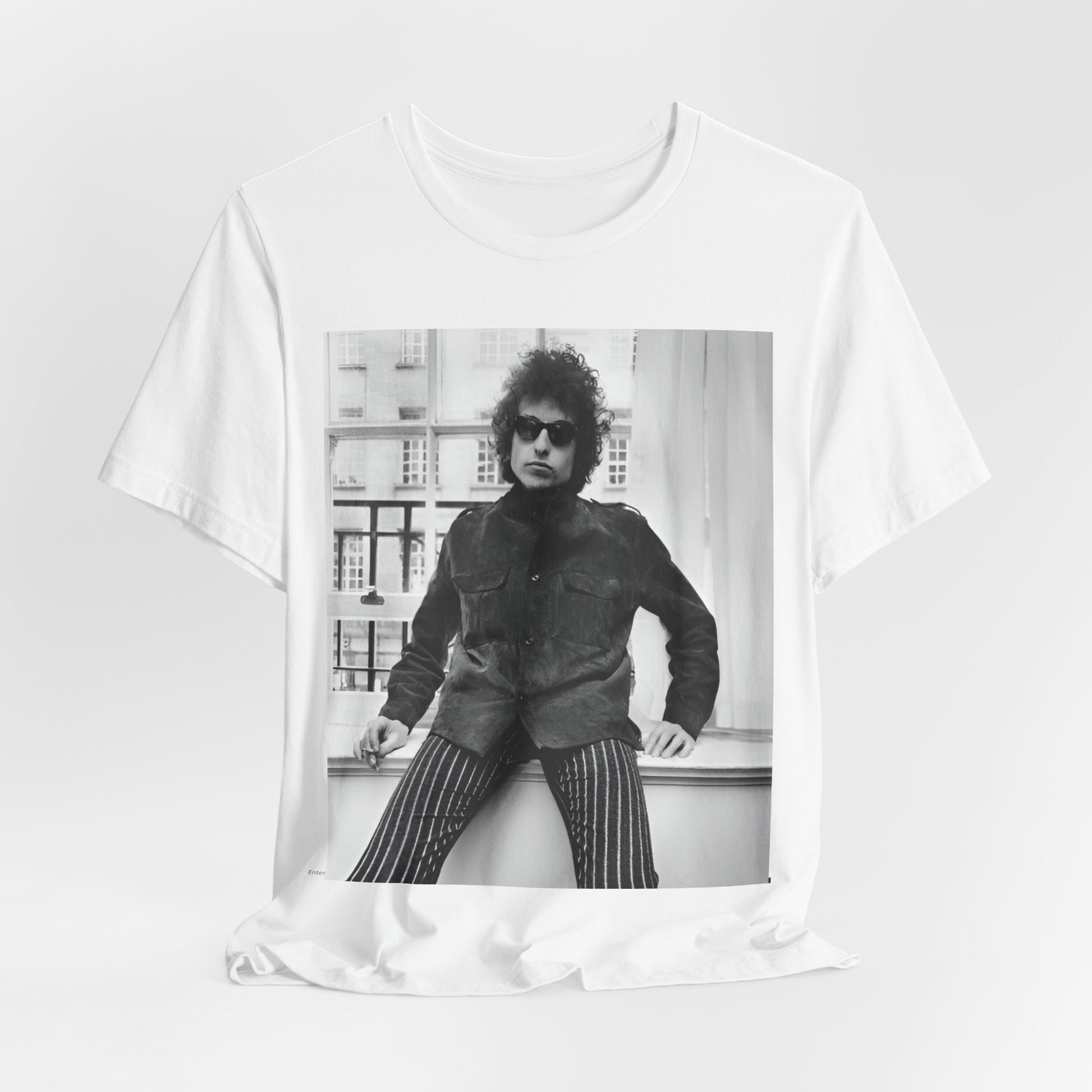 A black graphic t-shirt featuring a graphic related to Bob Dylan's 'Highway 61' era, possibly with album art elements or iconic imagery.