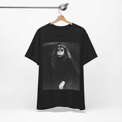 A black graphic t-shirt featuring a black and white, monochrome graphic or photo of Selena Gomez.