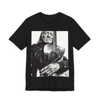 A black graphic t-shirt featuring a vintage country legend graphic of Willie Nelson.