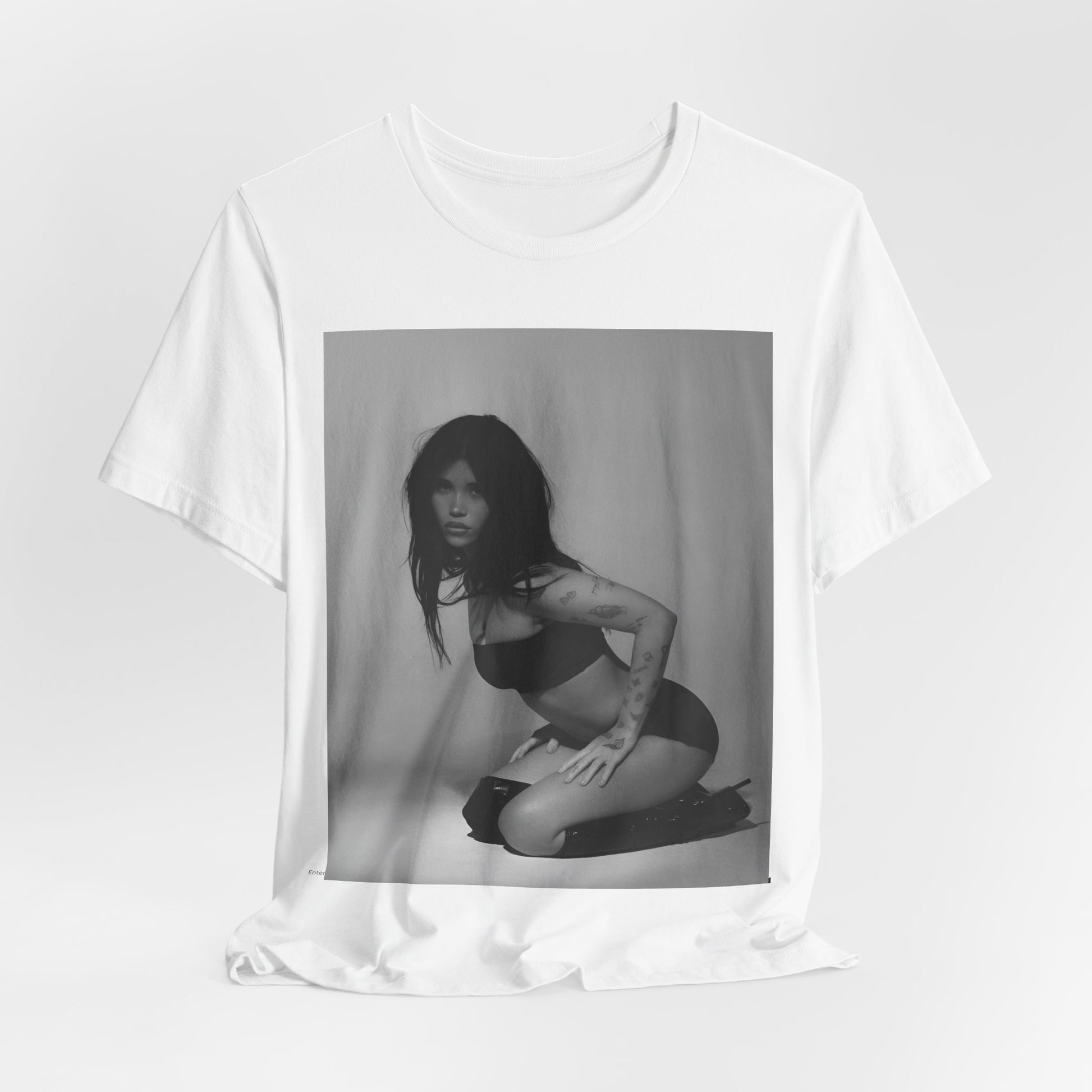 A black graphic t-shirt featuring a black and white, monochrome graphic or photo of Nessa Barrett.
