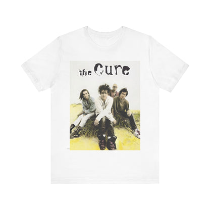A black graphic t-shirt featuring a graphic of The Cure as post-punk pioneers.