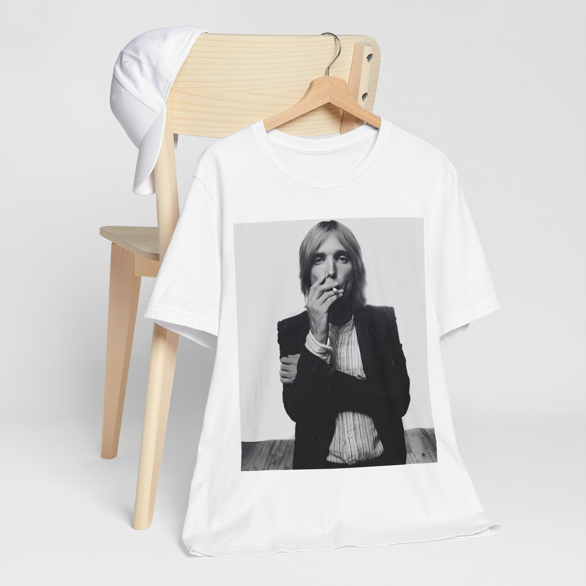 A black graphic t-shirt featuring a black and white graphic or photo of Tom Petty as a Southern rock icon.