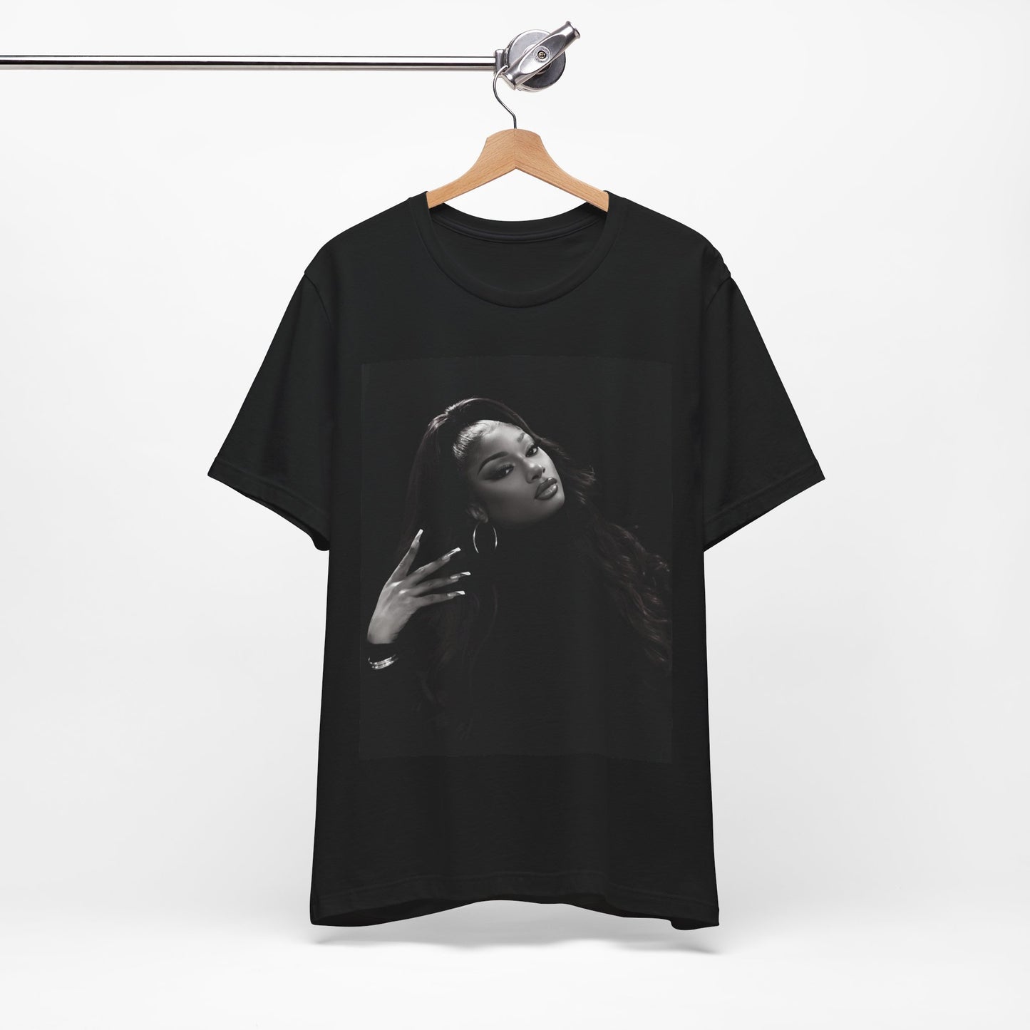 A black graphic t-shirt featuring a black and white, monochrome graphic or photo of Megan Thee Stallion.