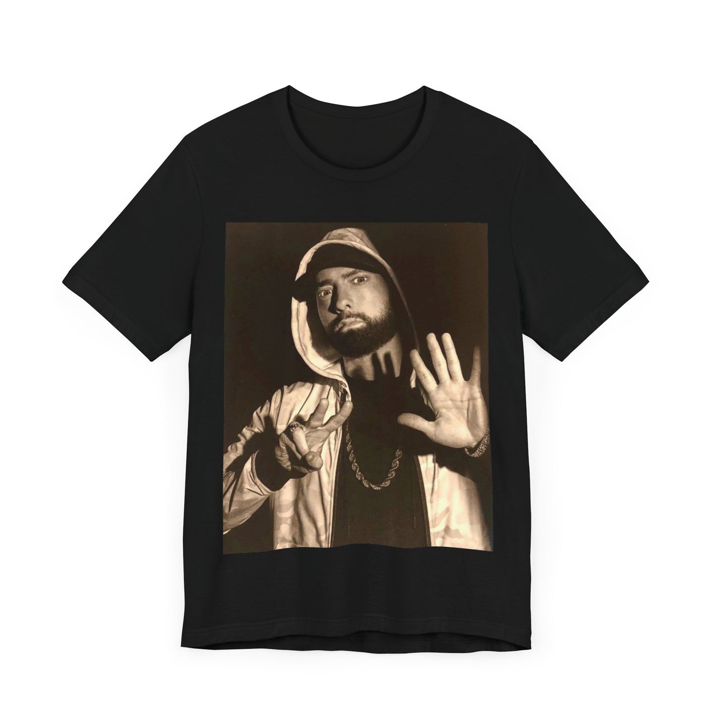 A black graphic t-shirt featuring a graphic of Eminem as an authentic underground rap icon.