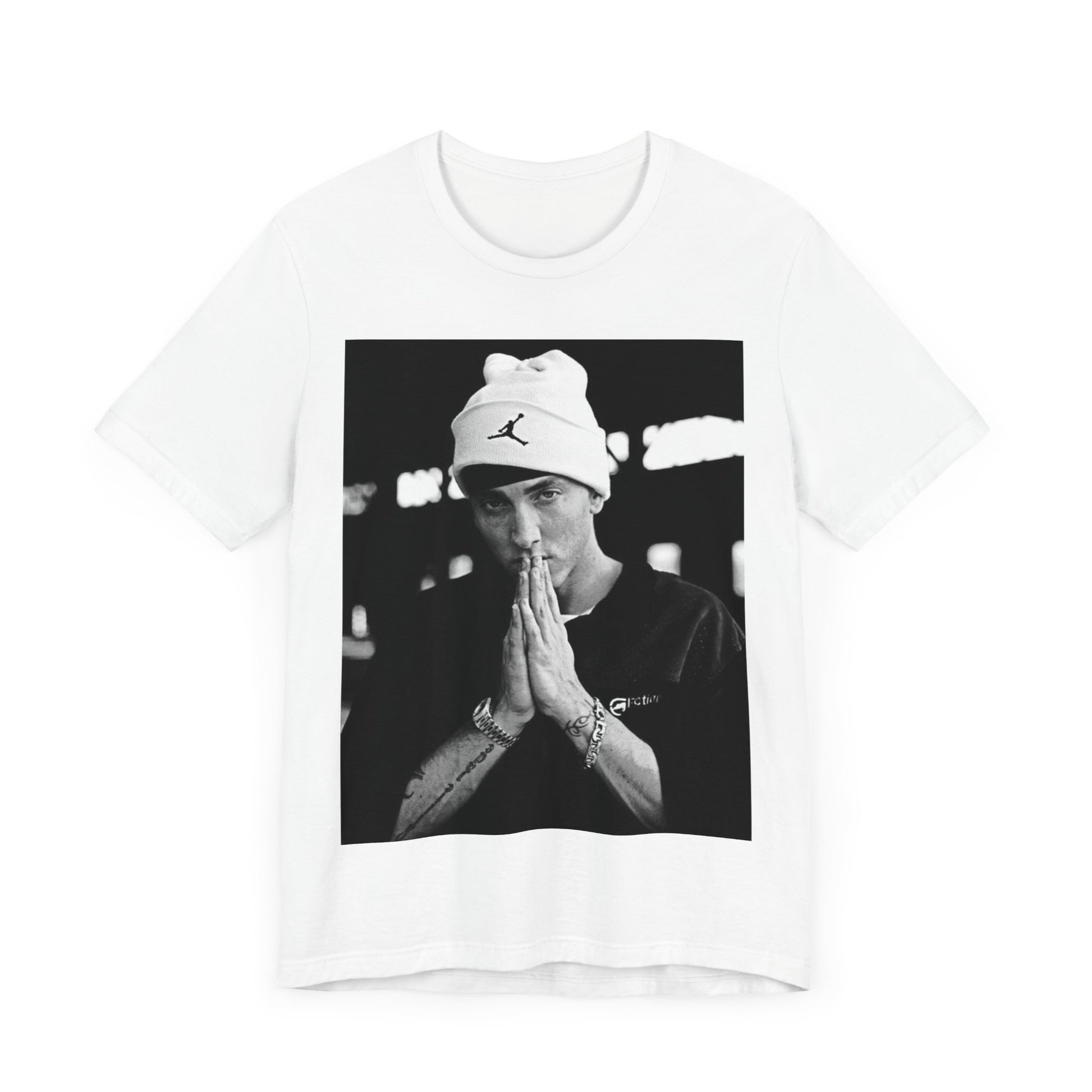 A black graphic t-shirt featuring a black and white portrait photo of Eminem.