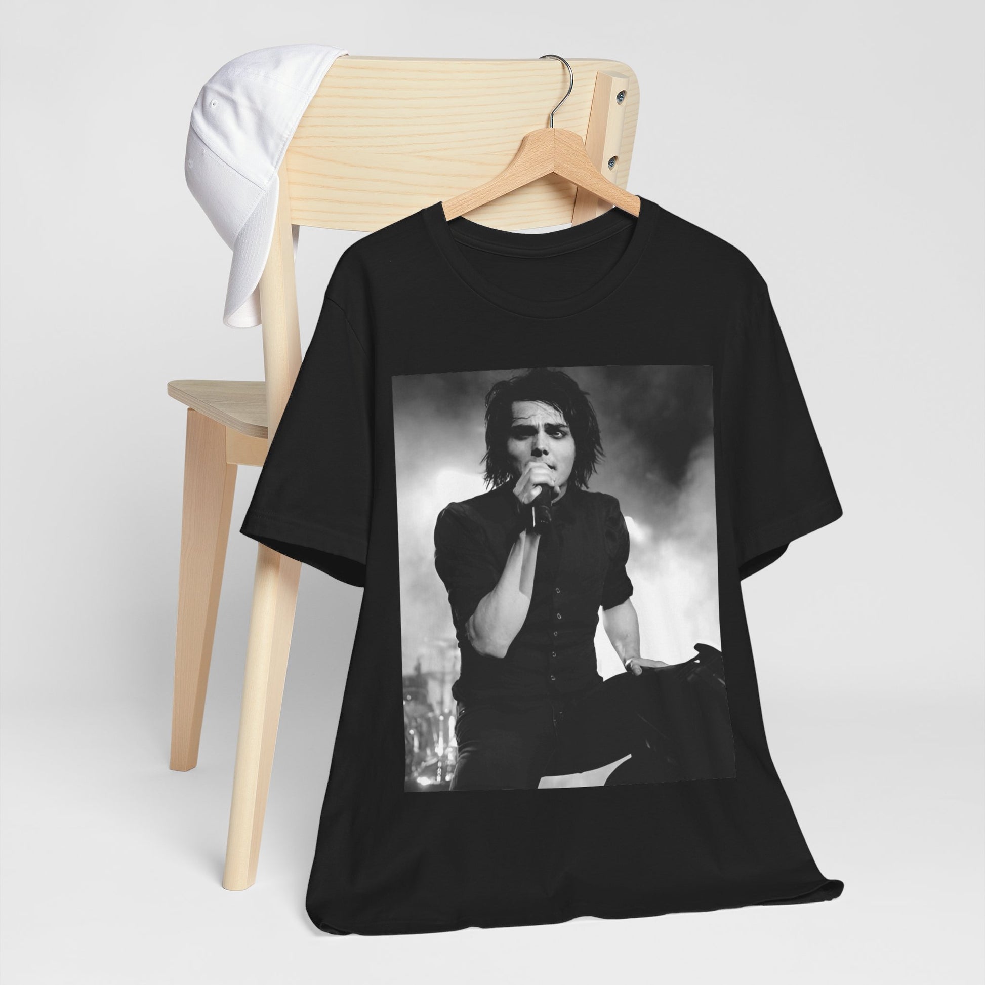 A black graphic t-shirt featuring a black and white graphic or photo of My Chemical Romance performing live in concert.
