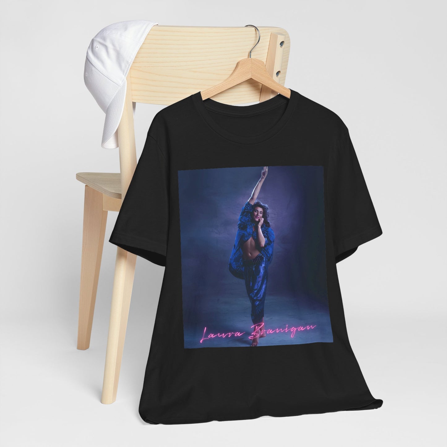 A black graphic t-shirt featuring an 80s synth pop aesthetic graphic of Laura Branigan.