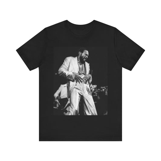A black graphic t-shirt featuring a 70s Motown concert graphic of Marvin Gaye.