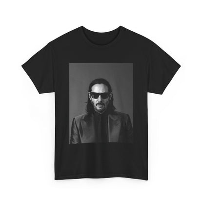 A black graphic t-shirt featuring an aesthetic graphic of Keanu Reeves as an action hero.