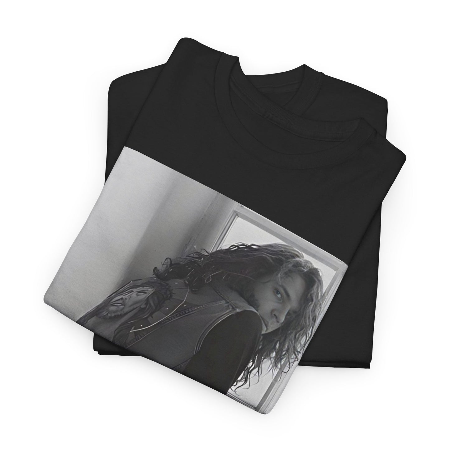 A black graphic t-shirt featuring a 90s black and white photo portrait of Michael Hutchence from INXS.