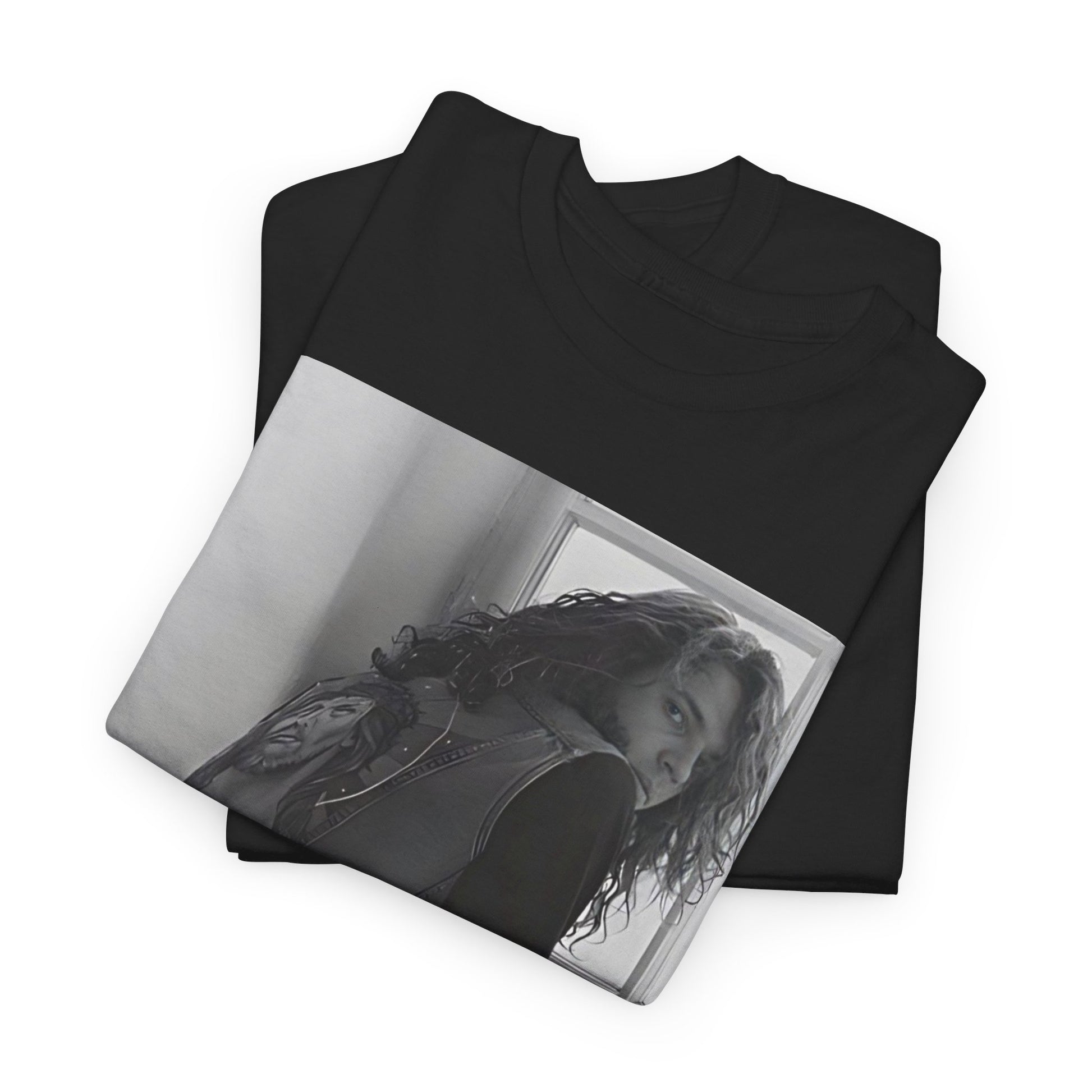 A black graphic t-shirt featuring a 90s black and white photo portrait of Michael Hutchence from INXS.