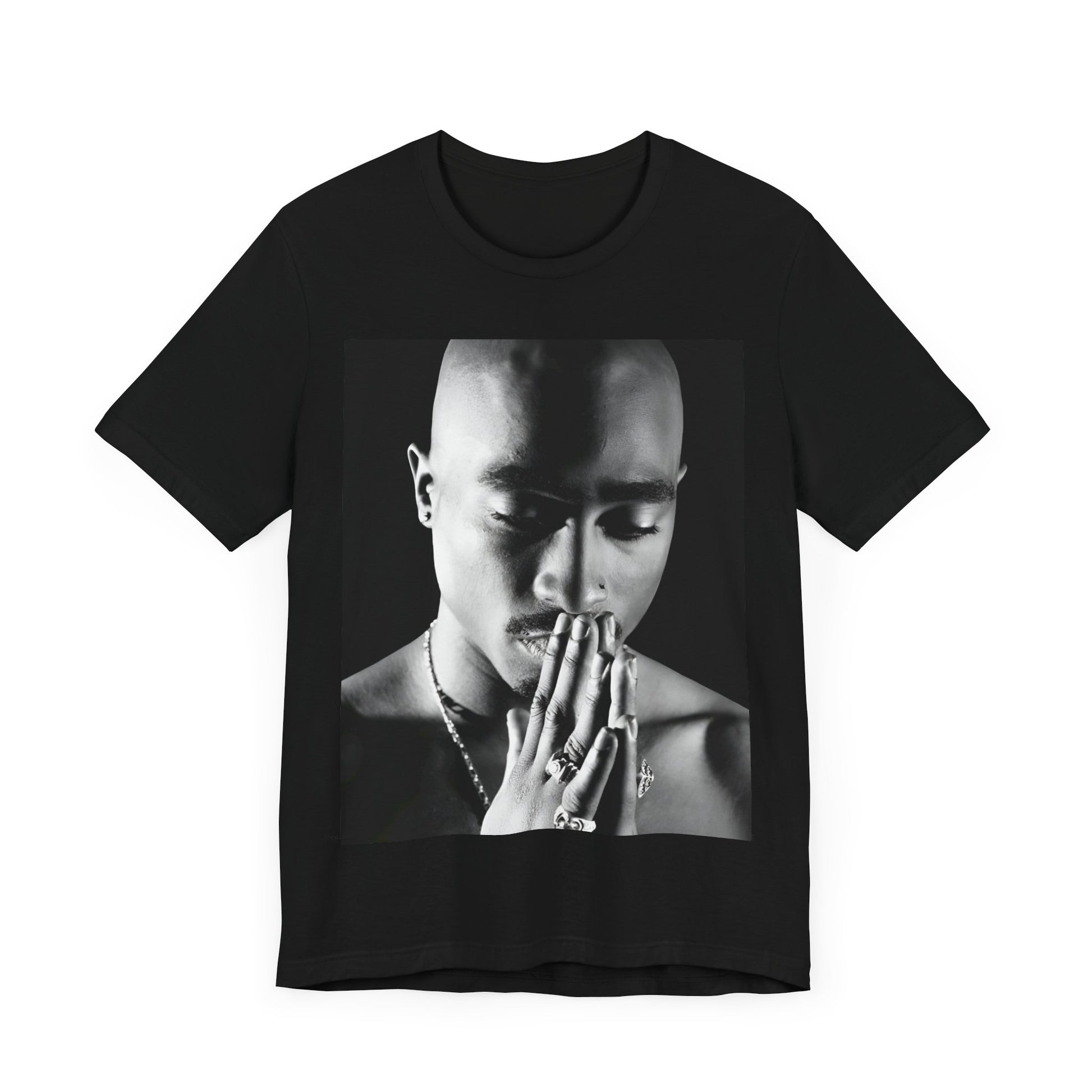A black graphic t-shirt featuring a black and white streetwear rebel graphic of Tupac.