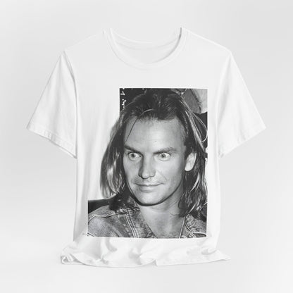 A black graphic t-shirt featuring a retro graphic related to Sting's 'Synchronicity' album era.