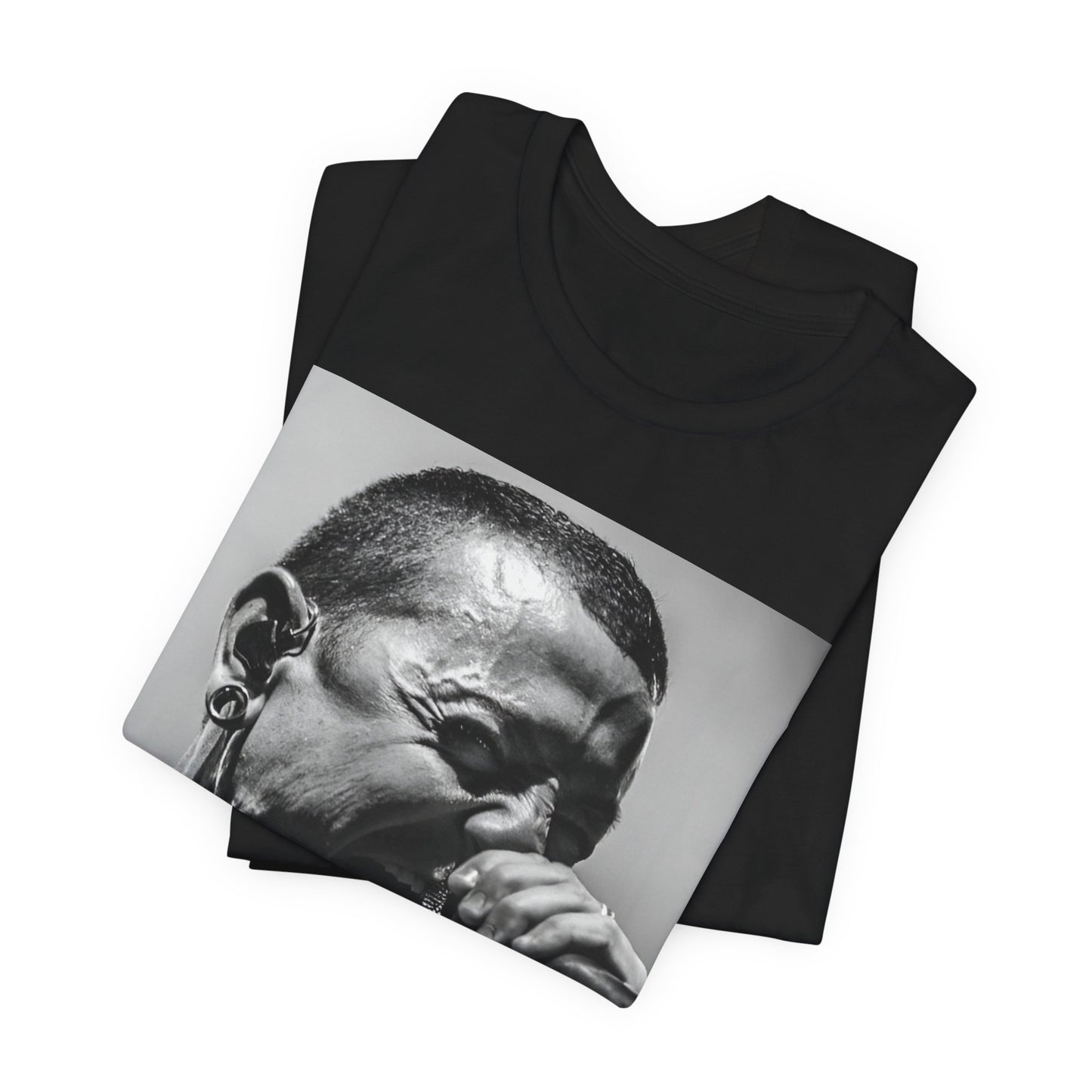A black graphic t-shirt featuring a fierce graphic of Linkin Park performing live on stage.