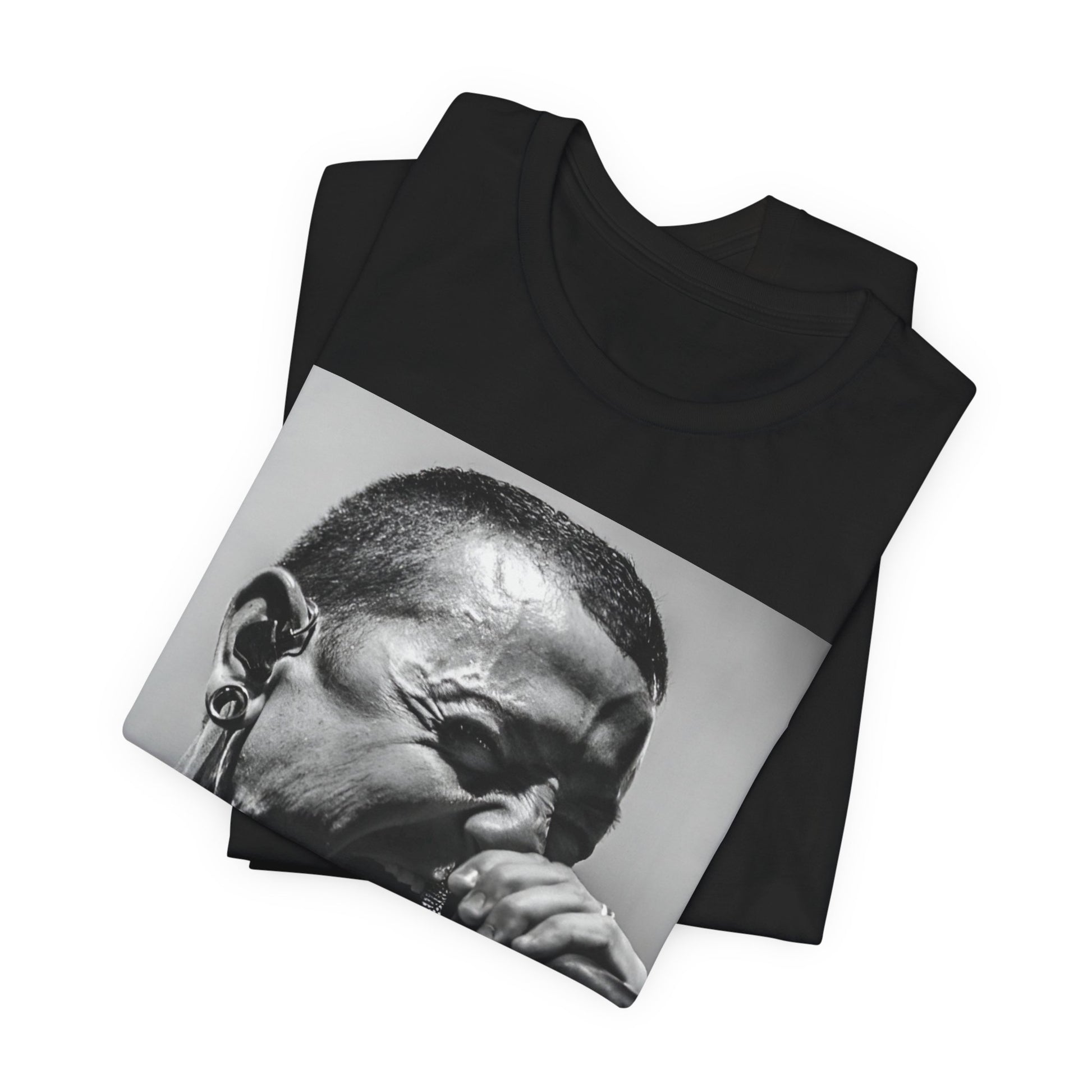 A black graphic t-shirt featuring a fierce graphic of Linkin Park performing live on stage.