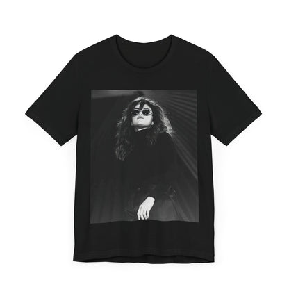 A black graphic t-shirt featuring a black and white, monochrome graphic or photo of Selena Gomez.