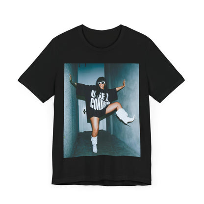 A black graphic t-shirt featuring a modern pop essential graphic of Rihanna.