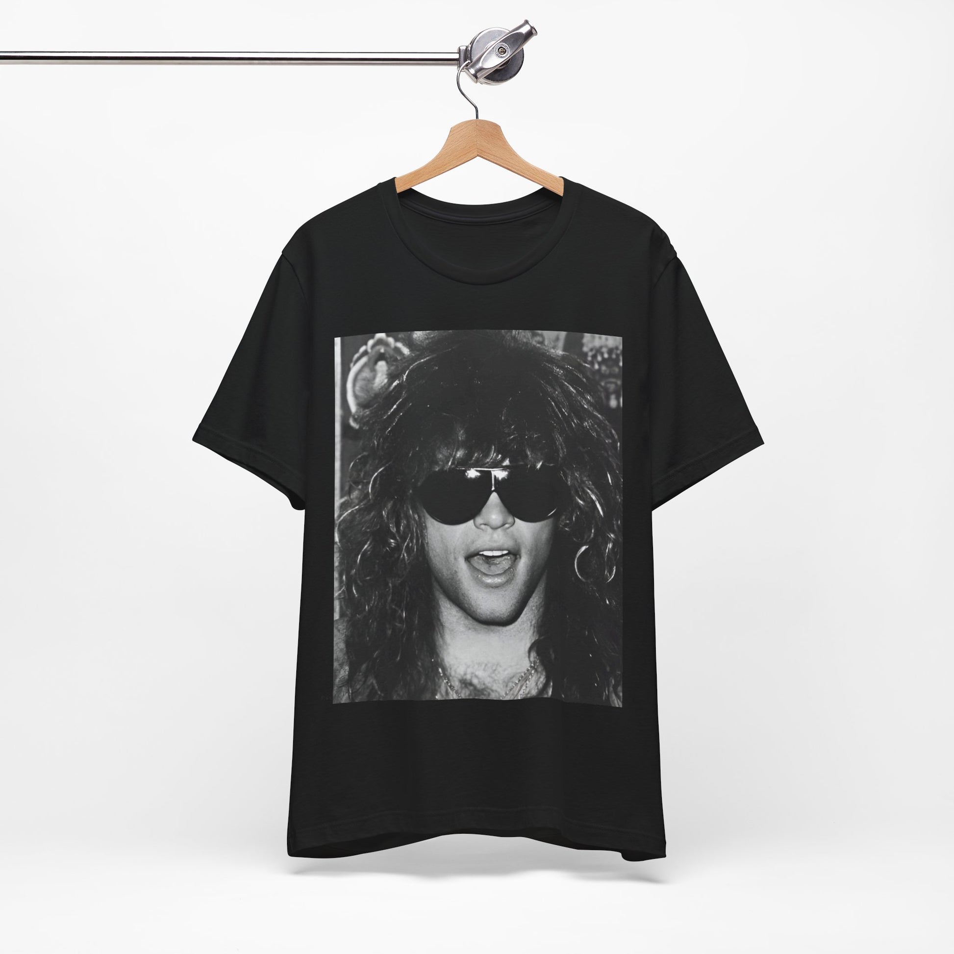 A black graphic t-shirt featuring a graphic or photo of Bon Jovi in a backstage setting.