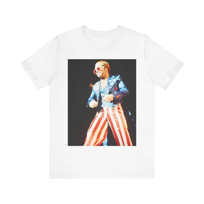 A black graphic t-shirt featuring a graphic related to Elton John's 70s America tour.