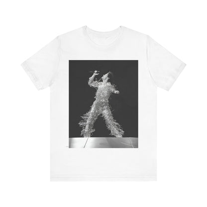 A black graphic t-shirt featuring a boxy pop aesthetic graphic of Harry Styles.