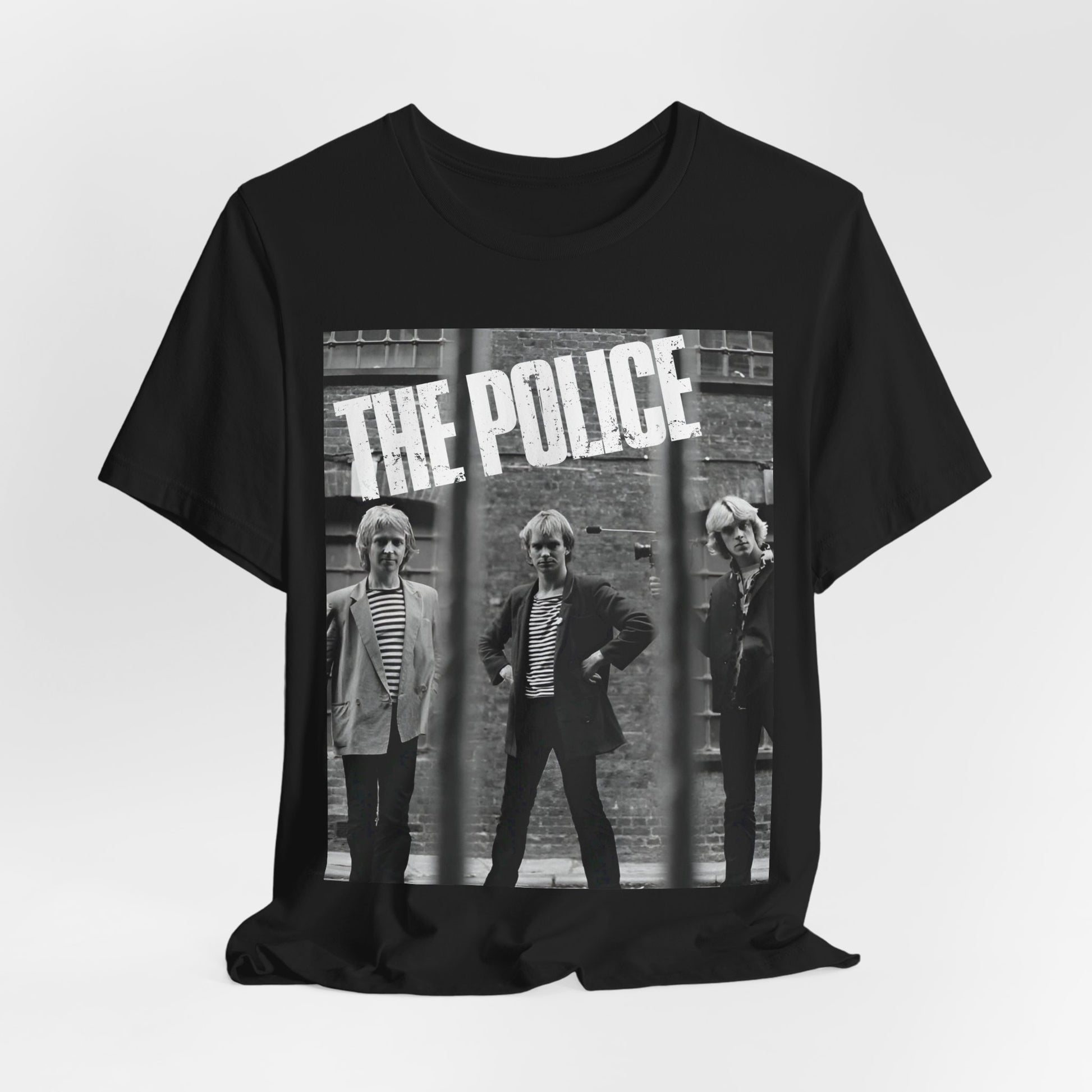 A black graphic t-shirt featuring a vintage new wave icon graphic of The Police.